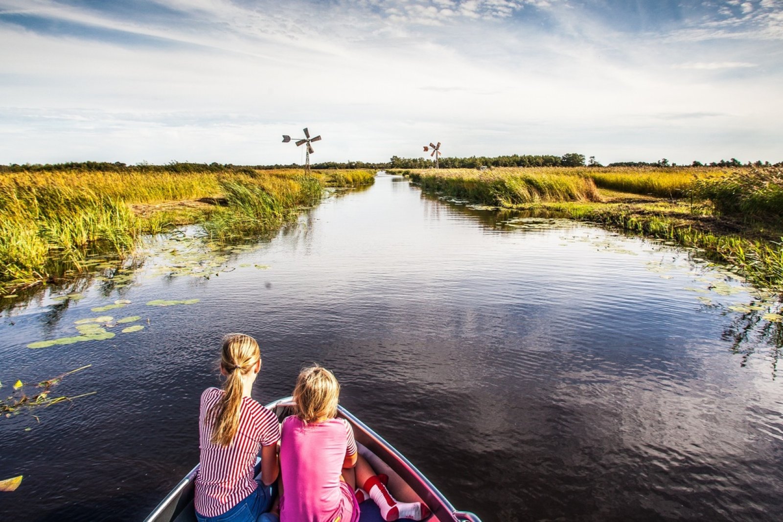 Kids on a boat in the Weerribben-Wieden