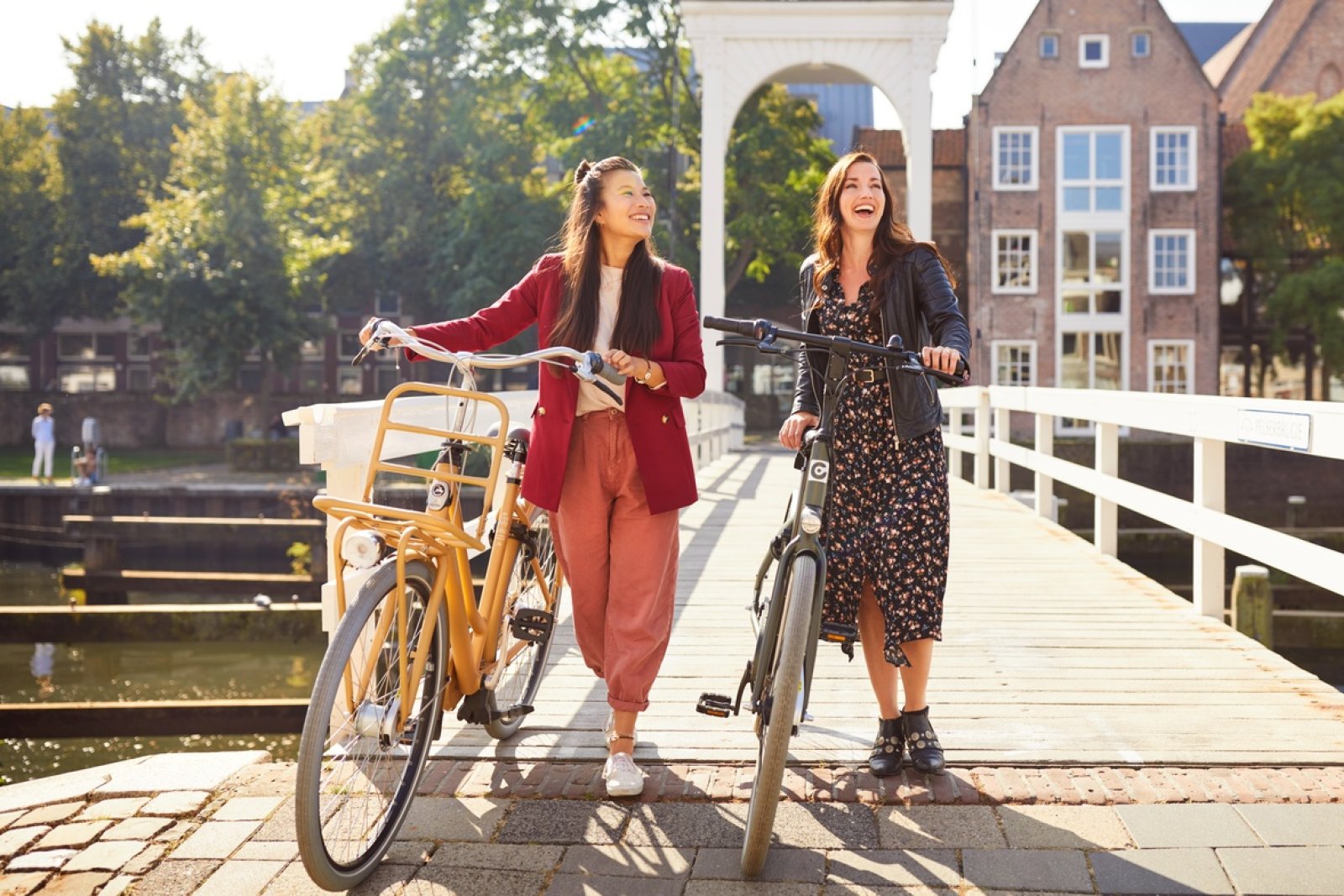 Young ladies with bicycle in Hanseatic city Zwolle 