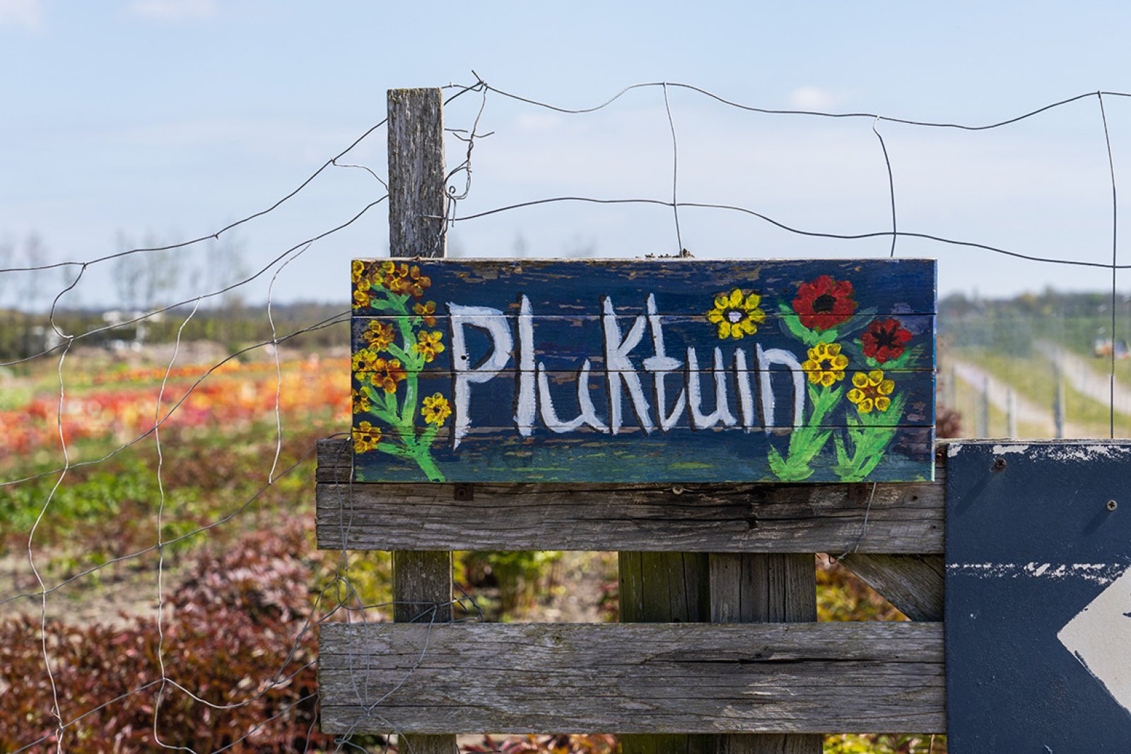 Picking garden sign