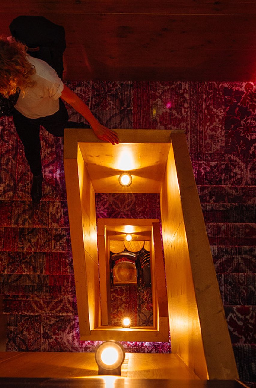 Lady walks down hotel stairs Utrecht